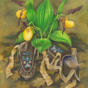 moccasins rest in the leaves under a cluster of yellow lady's slipper flowers