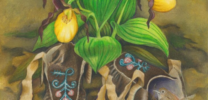 moccasins rest in the leaves under a cluster of yellow lady's slipper flowers