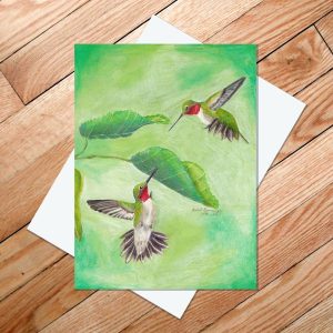 Greeting card of two male ruby-throated hummingbirds squaring off to fight