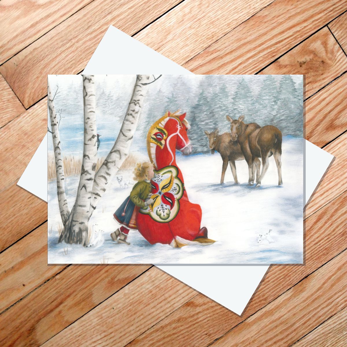greeting card of a little Swedish girl and dala horse watching nature in a wintery scene