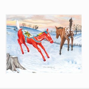 an appaloosa and dala horse foal leap in the snow