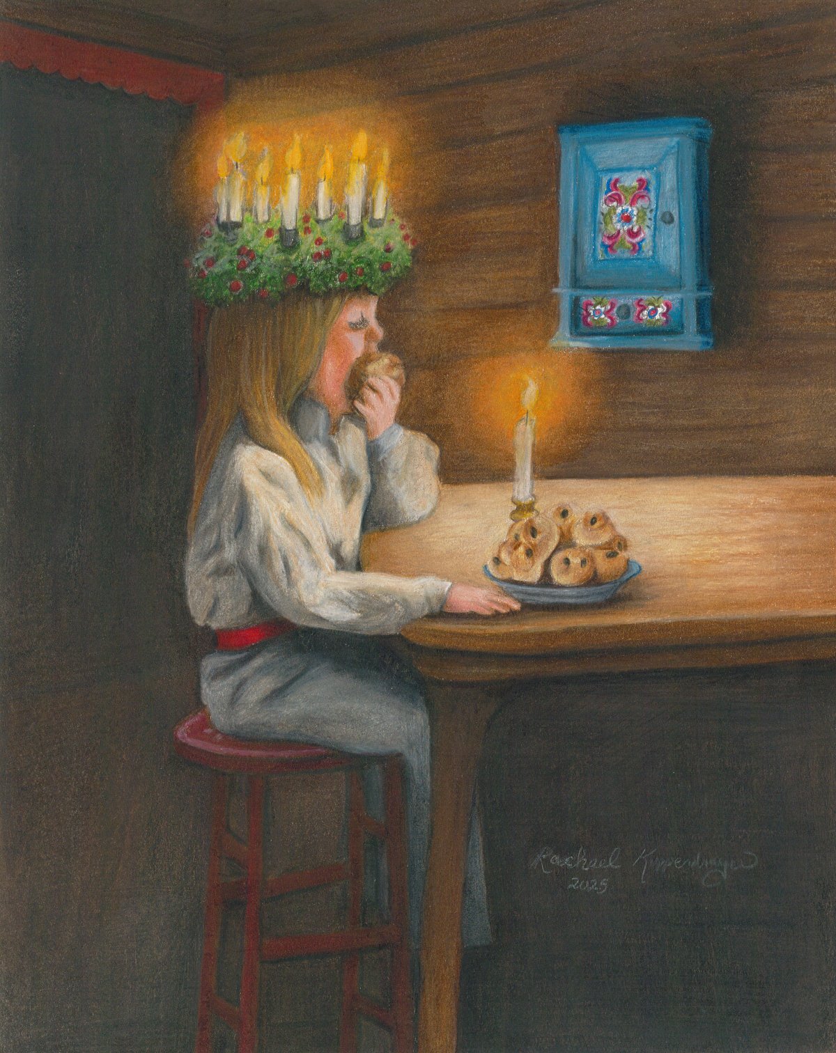 Little St Lucia eats buns by candle light